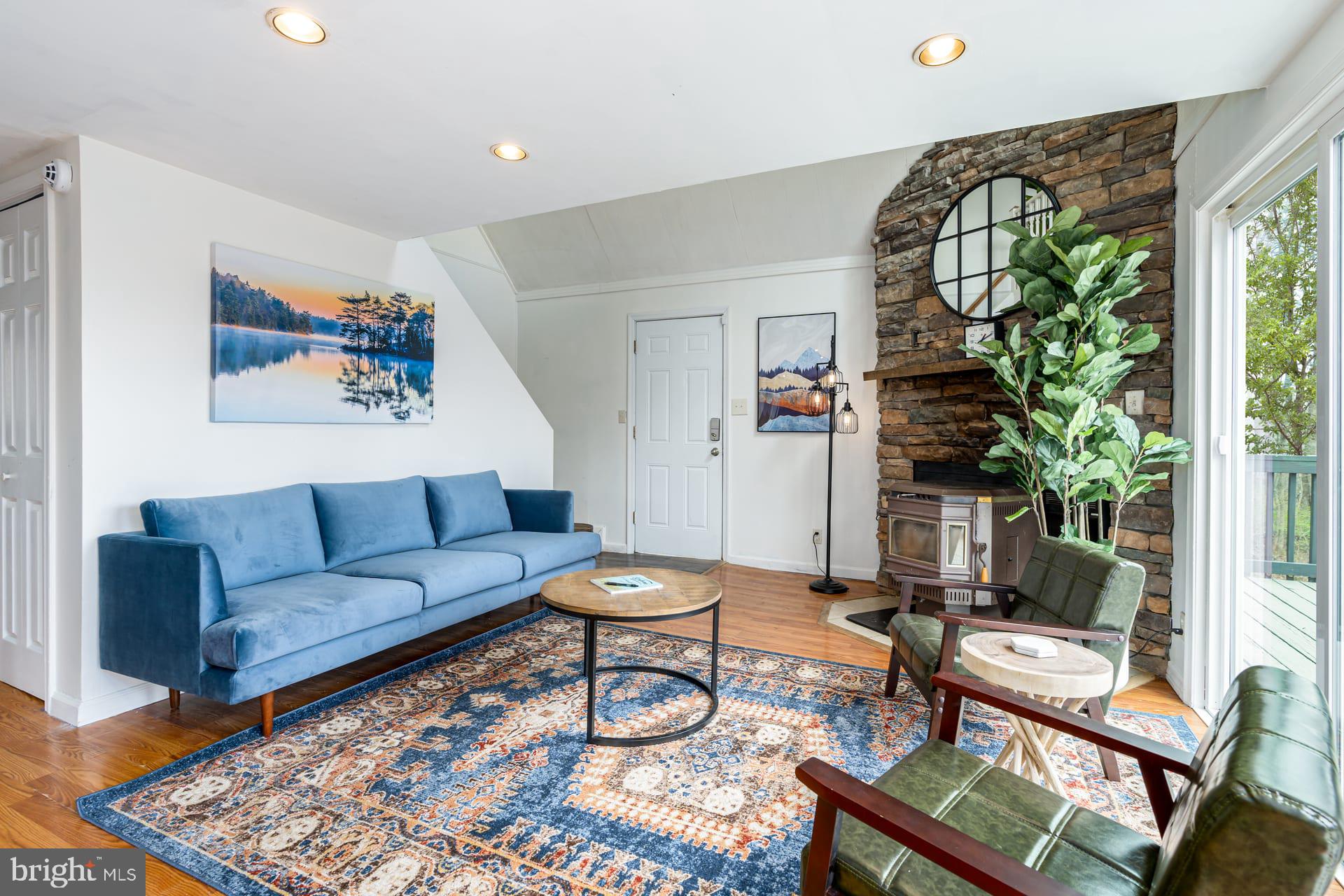 1125 Nancy Jack Road Gerrardstown, WV 25420 - Photo 8 of 24 a living room with furniture and a potted plant