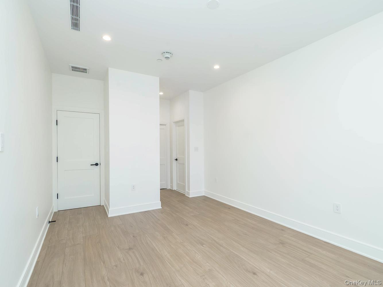 24 Lumber Road, Unit 1 Roslyn, NY 11576 - Photo 14 of 18 a view of an empty room