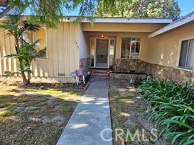 a view of backyard of a house