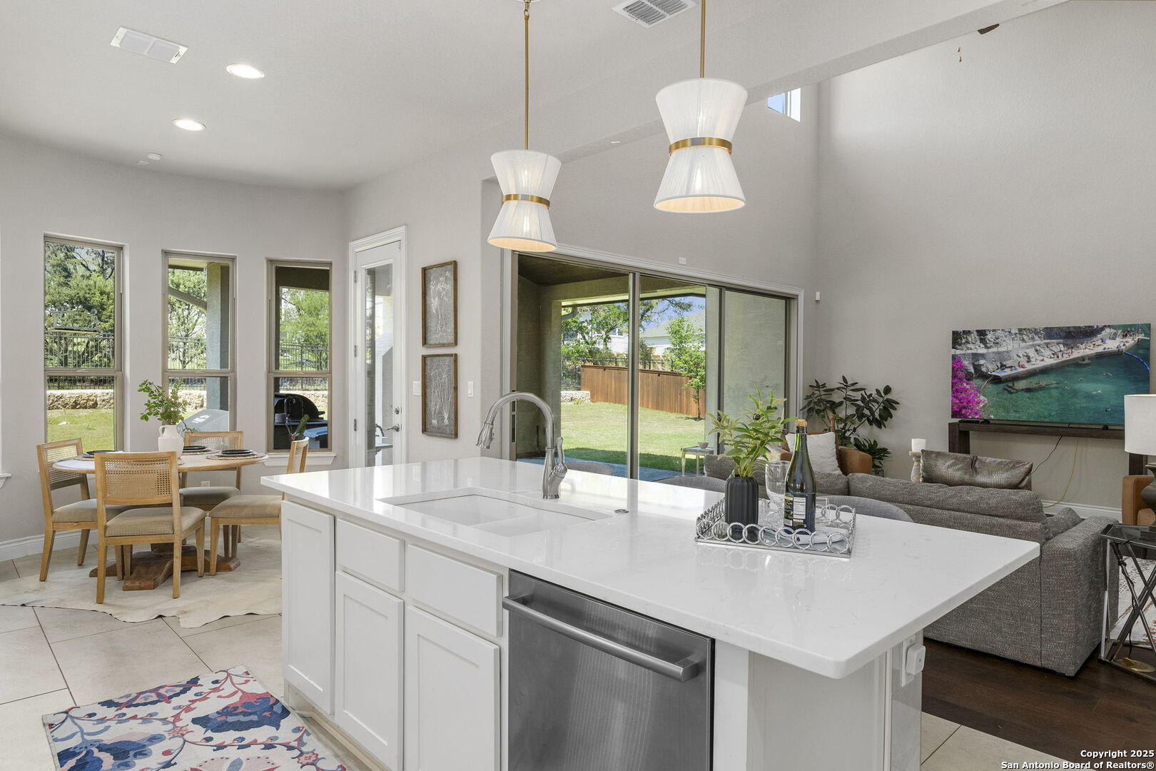 18323 Powder San Antonio, TX 78257 - Photo 13 of 42 a kitchen with a counter space a sink and living room view