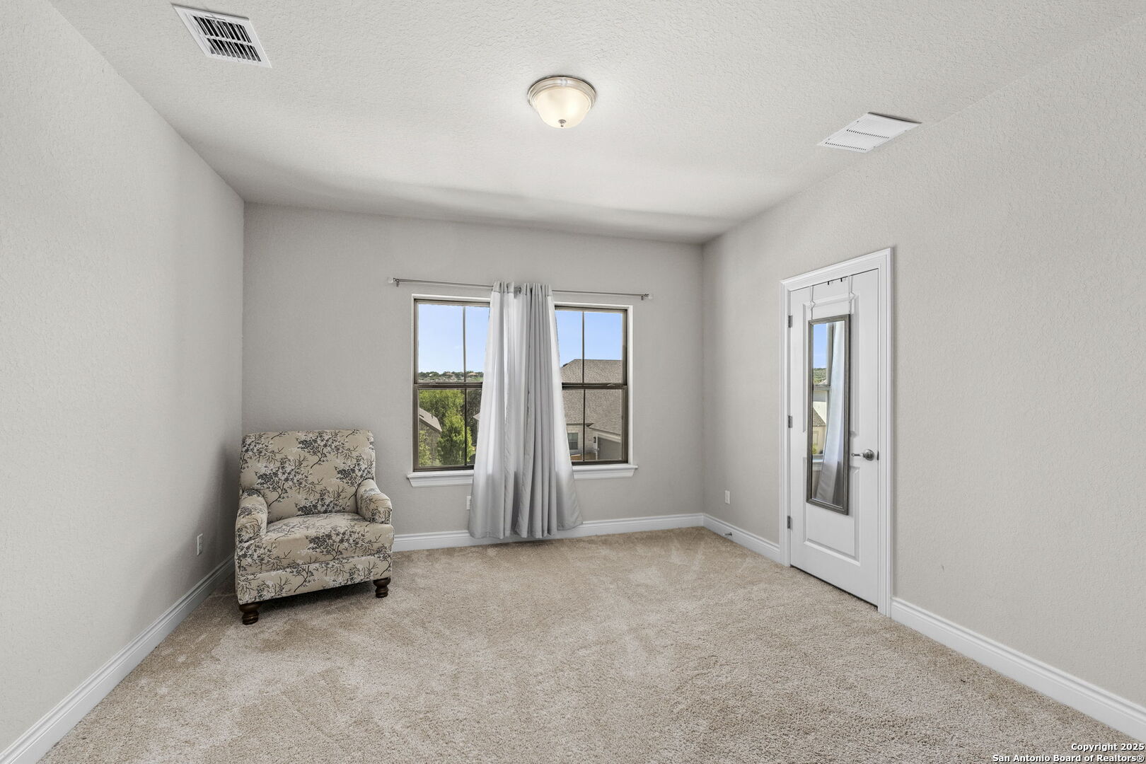 18323 Powder San Antonio, TX 78257 - Photo 24 of 42 a living room with furniture and a window