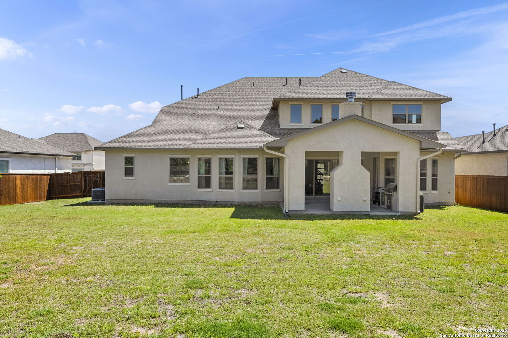 18323 Powder San Antonio, TX 78257 - Photo 38 of 42 a big house with a big yard and large trees