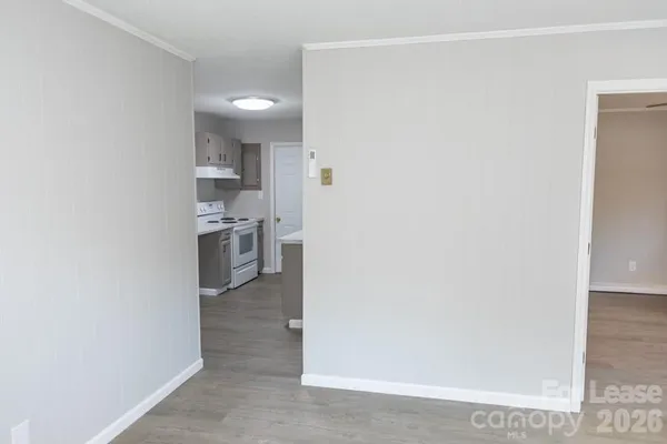 a view of kitchen with wooden floor