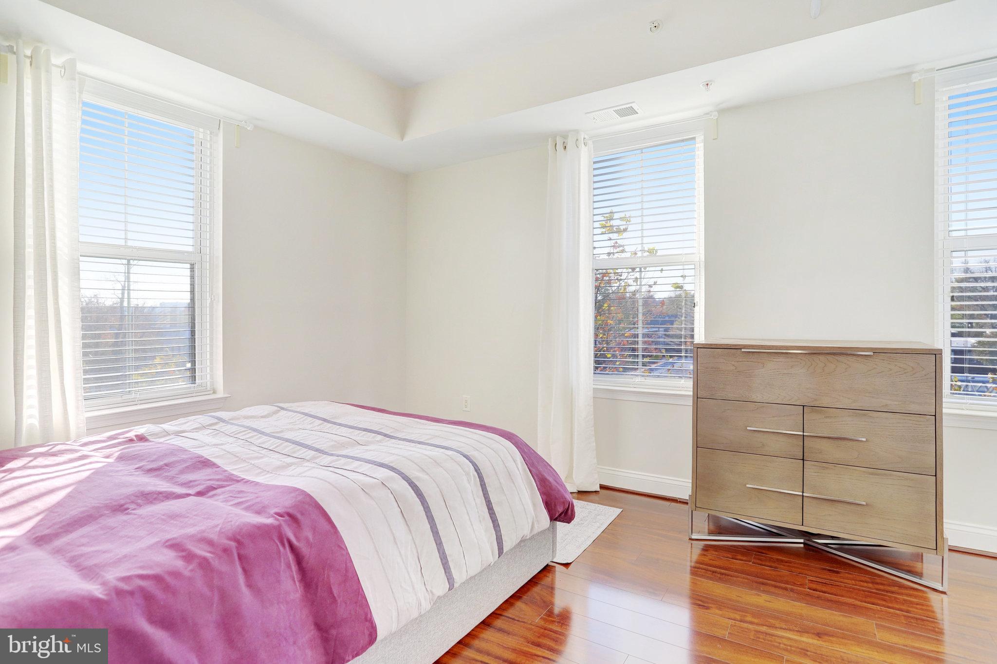 1111 Oronoco Street, Unit 430 Alexandria, VA 22314 - Photo 34 of 73 CORNER BEDROOM WITH LOTS OF NATURAL LIGHT