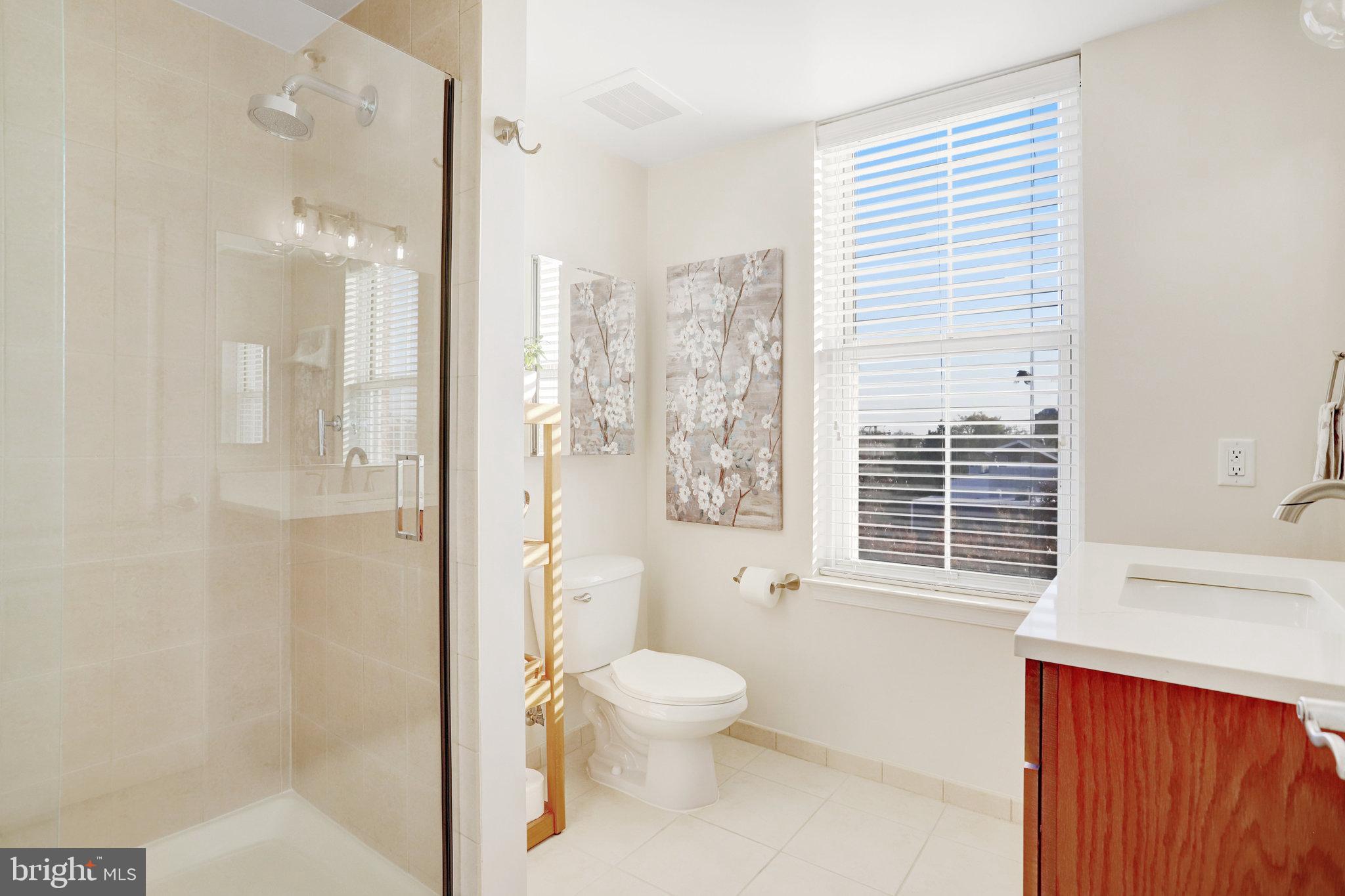 1111 Oronoco Street, Unit 430 Alexandria, VA 22314 - Photo 36 of 73 GUEST BATHROOM