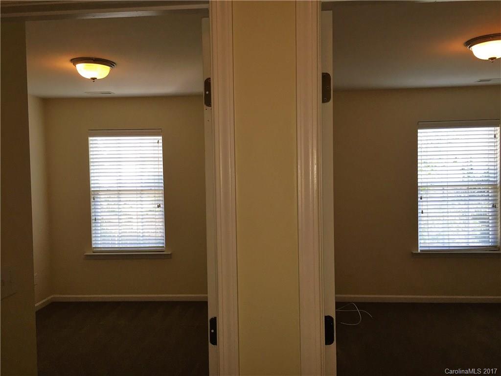 2137 Midnight Blue Lane, Unit 186 Fort Mill, SC 29708 - Photo 12 of 14 a view of an empty room with a window