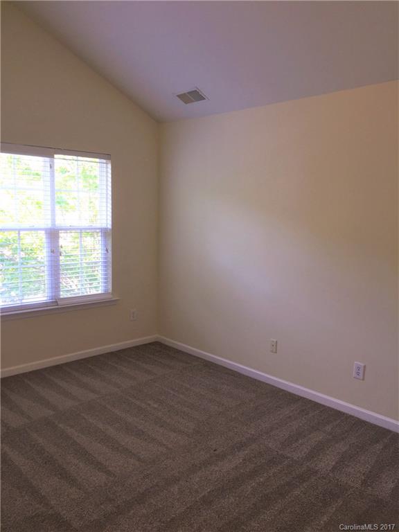 2137 Midnight Blue Lane, Unit 186 Fort Mill, SC 29708 - Photo 9 of 14 an empty room with a window