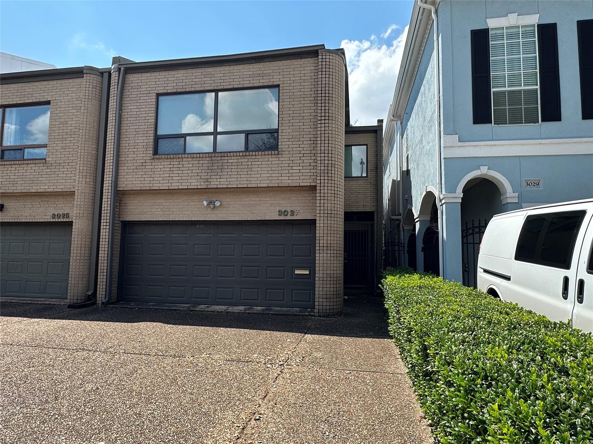 3027 Bissonnet Street Houston, TX 77005 - Photo 2 of 38 a front view of a house with garage