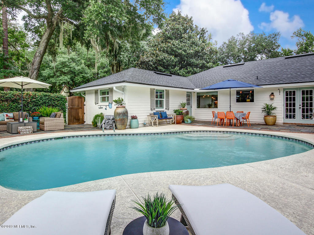 2916 Bernice Drive Jacksonville, FL 32257 - Photo 1 of 1 a front view of a house with garden