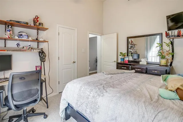 a bathroom with a toilet sink and vanity