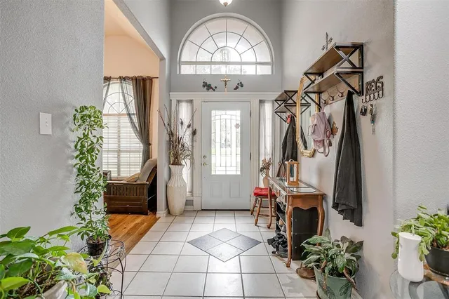 a view of a entryway with flower pots