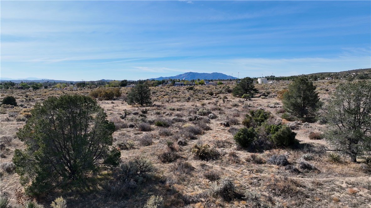 37800 Bohlen Road Anza, CA 92539 - Photo 10 of 13 a view of a large building with a mountain in the background