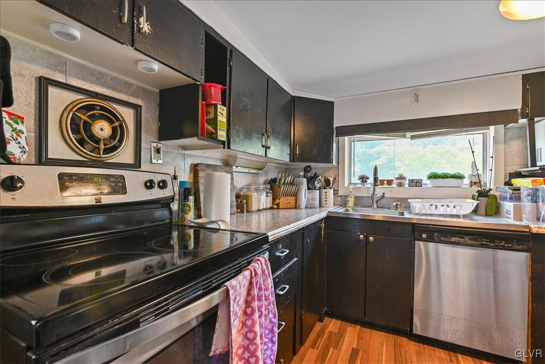 1324 Main Street Northampton, PA 18067 - Photo 23 of 49 a kitchen with stainless steel appliances granite countertop a stove and cabinets