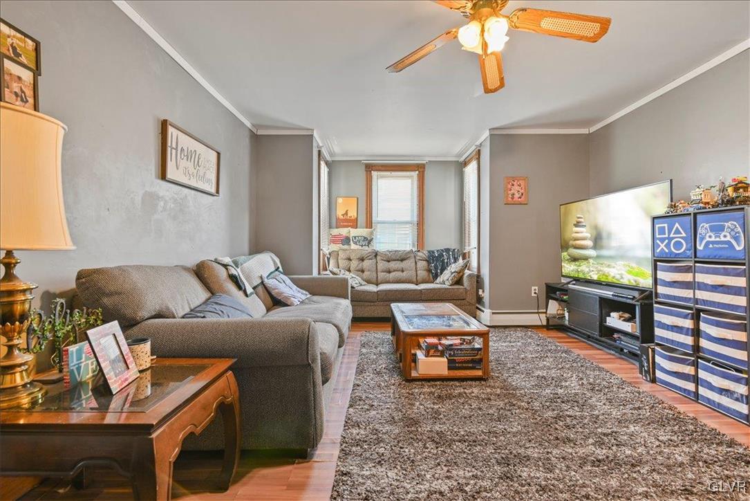 1324 Main Street Northampton, PA 18067 - Photo 27 of 49 a living room with furniture a window and a flat screen tv