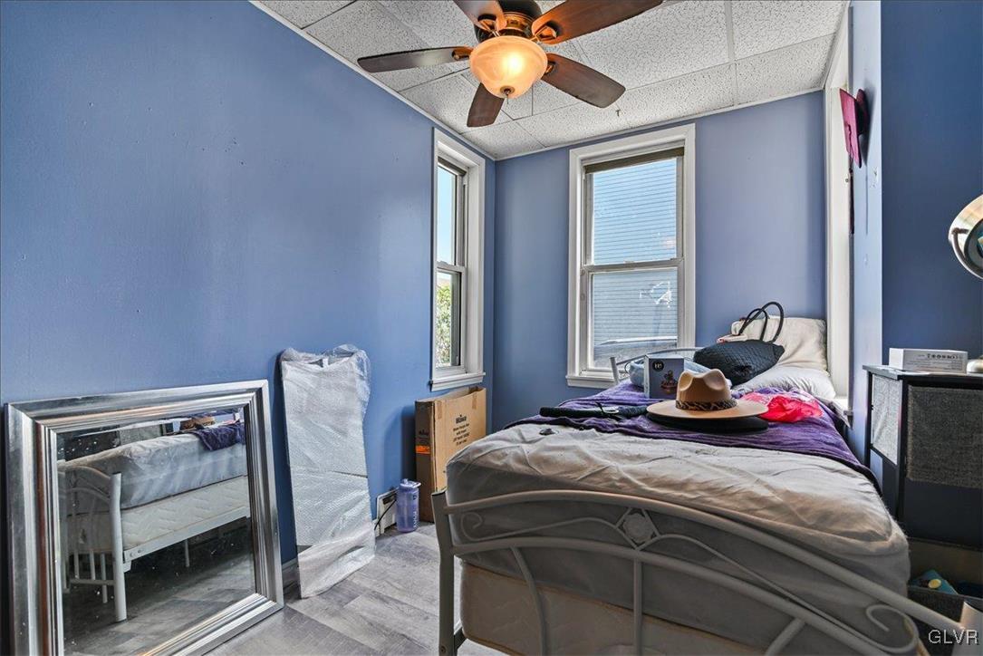 1324 Main Street Northampton, PA 18067 - Photo 48 of 49 a bedroom with a bed and a chandelier