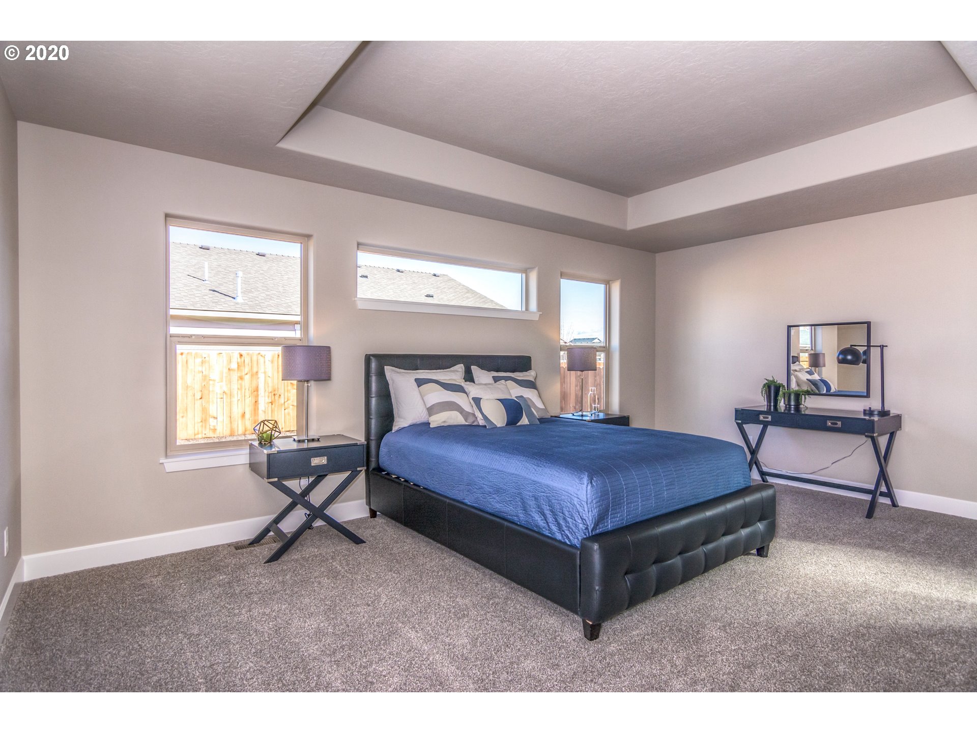 475 South 10th Street Monroe, OR 97456 - Photo 22 of 24 a bedroom with a bed table chair and a window