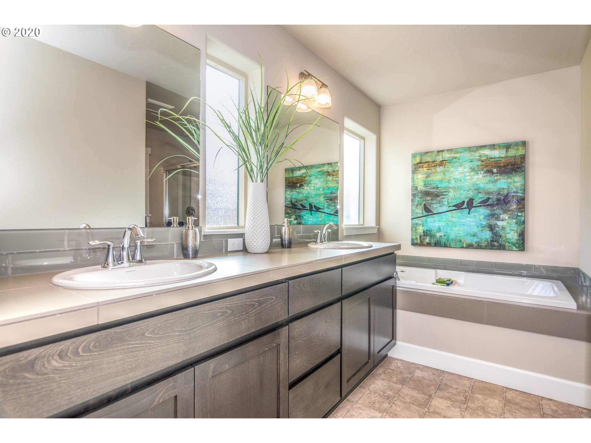 475 South 10th Street Monroe, OR 97456 - Photo 23 of 24 a bathroom with a granite countertop sink and a large mirror