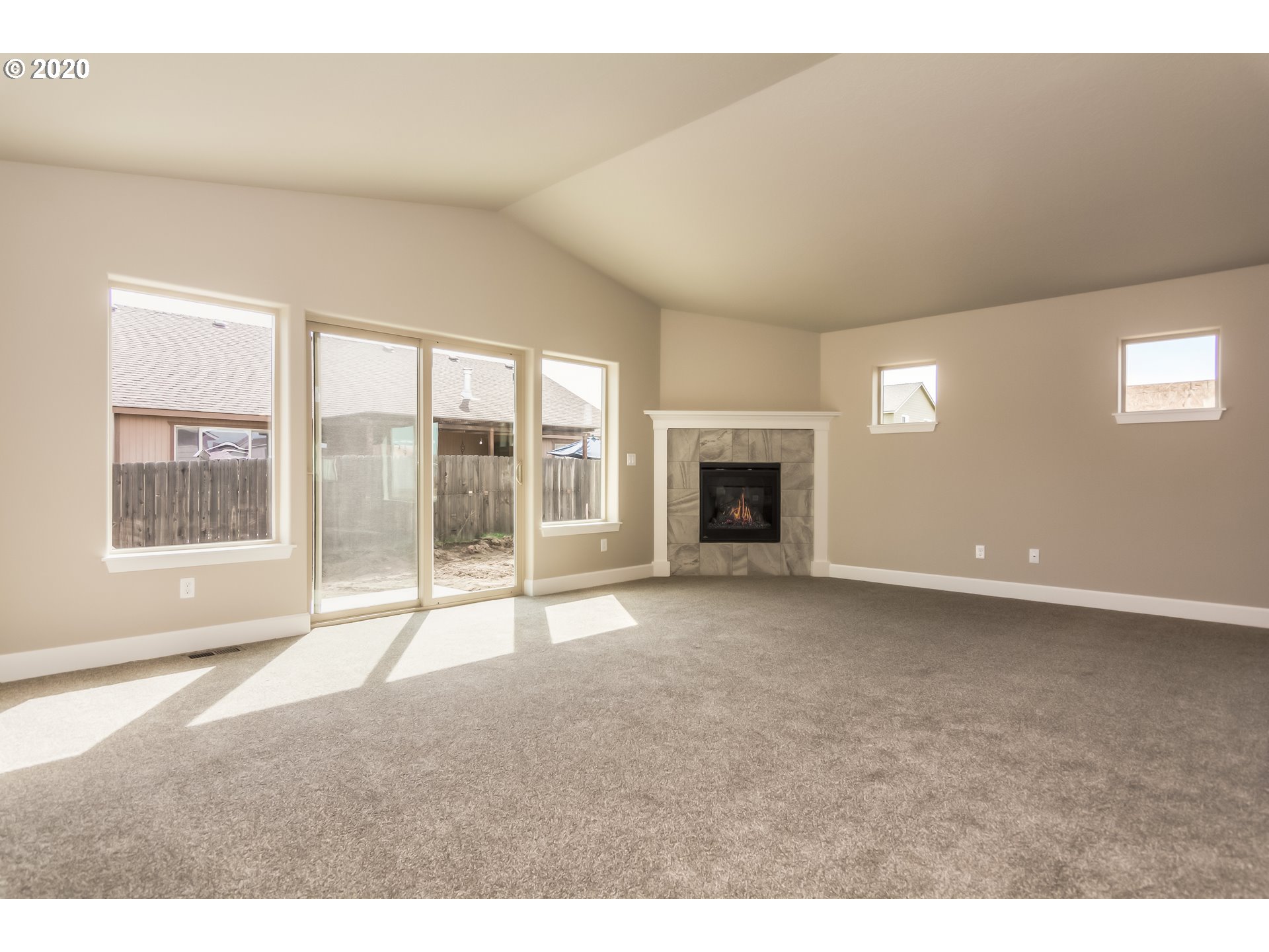 475 South 10th Street Monroe, OR 97456 - Photo 8 of 24 a view of an empty room with a fireplace