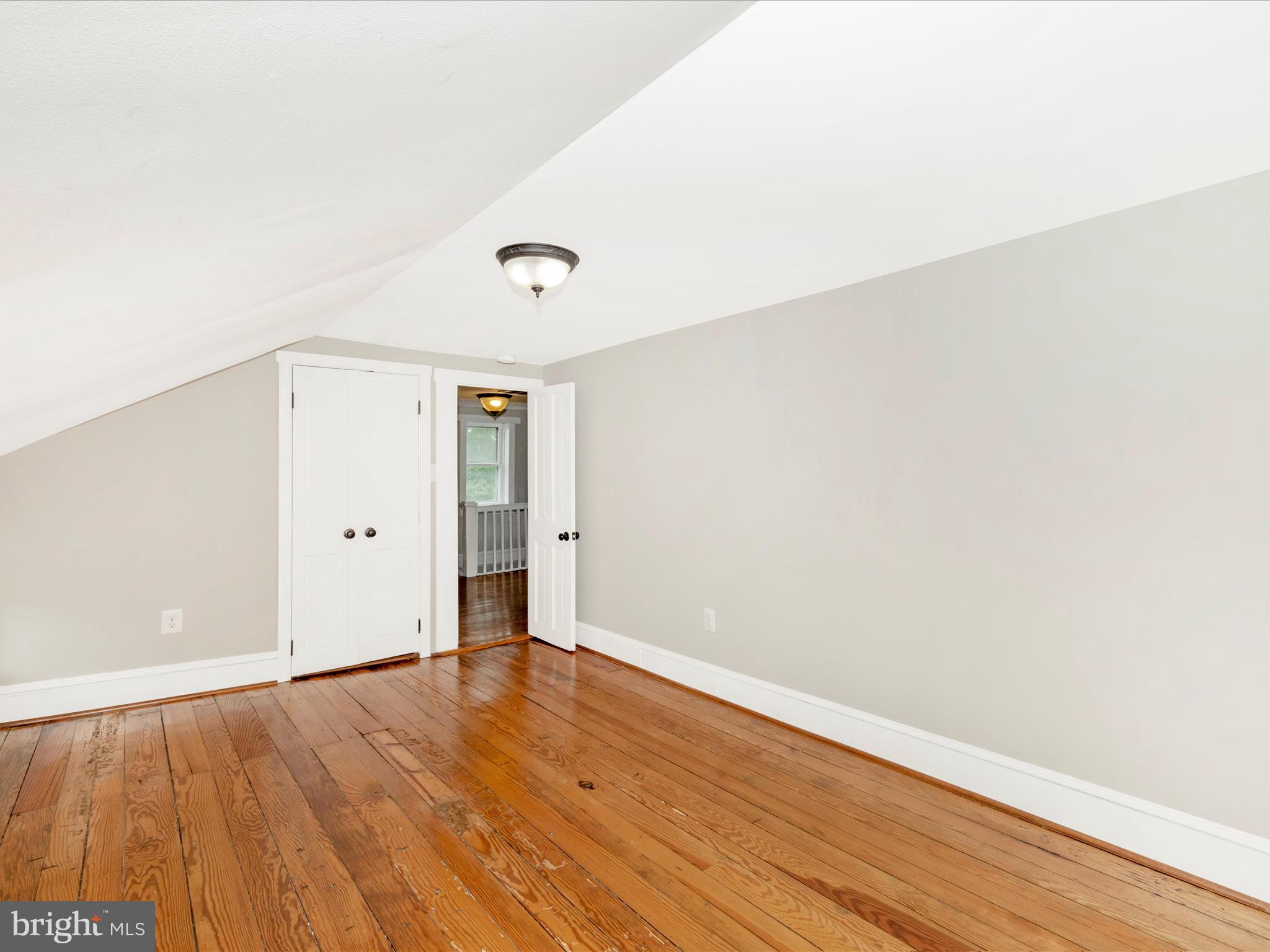 12261 Baugher Road Thurmont, MD 21788 - Photo 42 of 61 an empty room with wooden floor