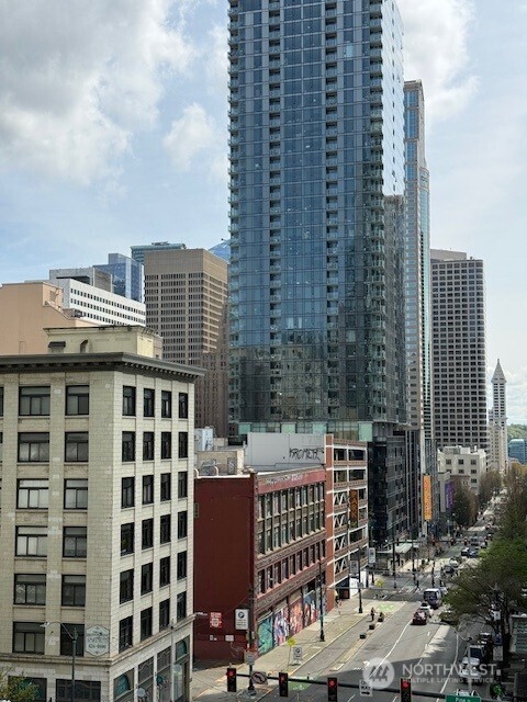 121 Stewart Street, Unit 504 Seattle, WA 98101 - Photo 27 of 27 a view of a city with tall buildings