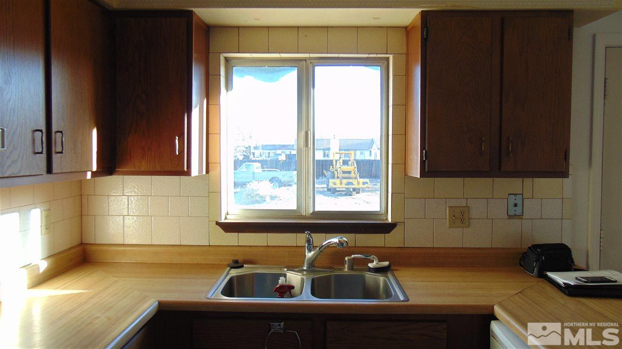 178 Roughing It Road Dayton, NV 89403 - Photo 8 of 14 a bathroom with a sink and a bathtub