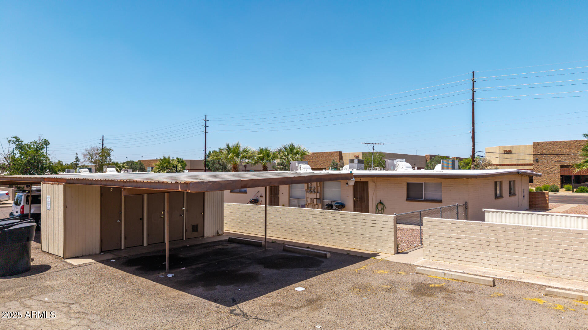 1145 West Southern Avenue Tempe, AZ 85282 - Photo 5 of 13 a view of a balcony with two chairs