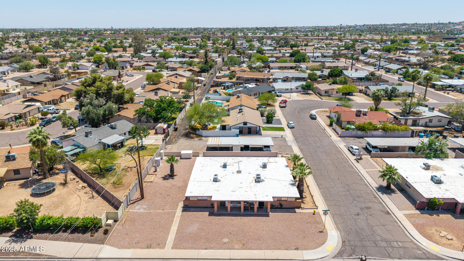 1145 West Southern Avenue Tempe, AZ 85282 - Photo 6 of 13 an aerial view of a house with a yard