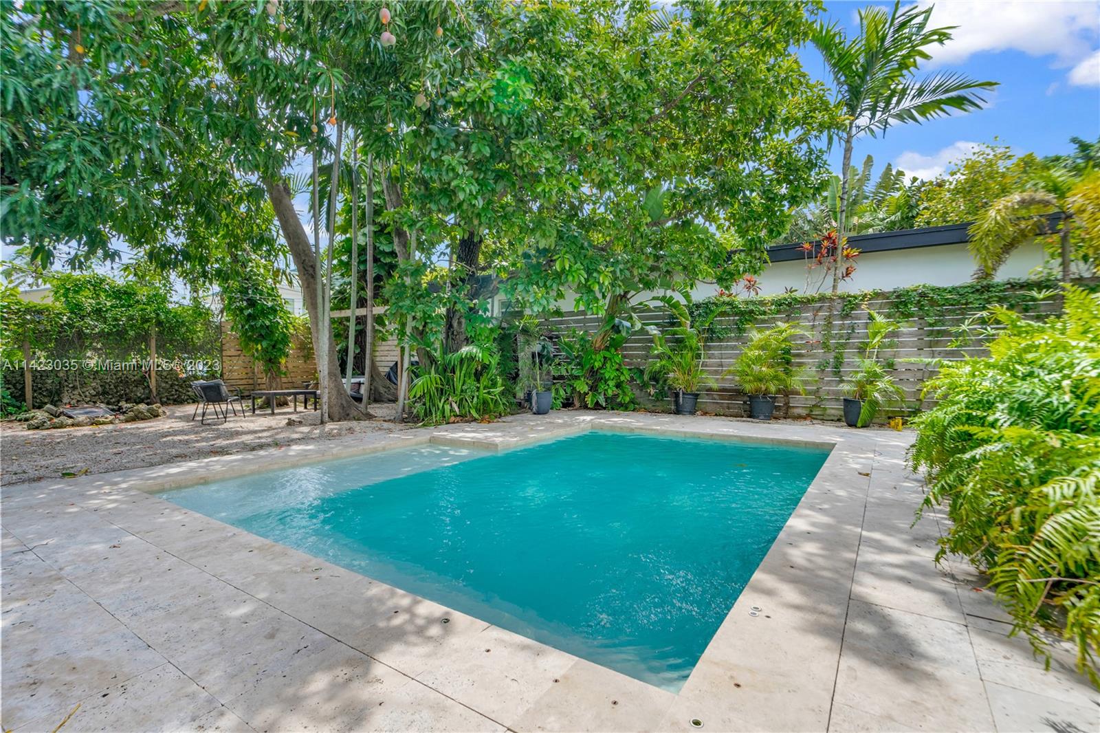 419 Southwest 30th Road, Unit 419 Miami, FL 33129 - Photo 16 of 21 a view of a backyard with a garden