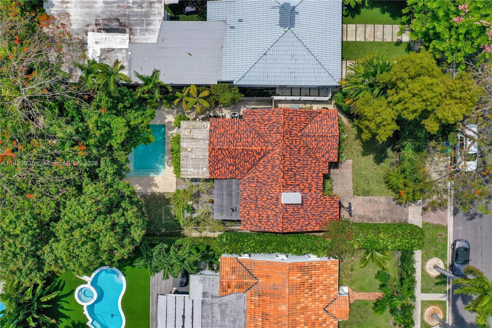 419 Southwest 30th Road, Unit 419 Miami, FL 33129 - Photo 20 of 21 an aerial view of a house with yard and seating space