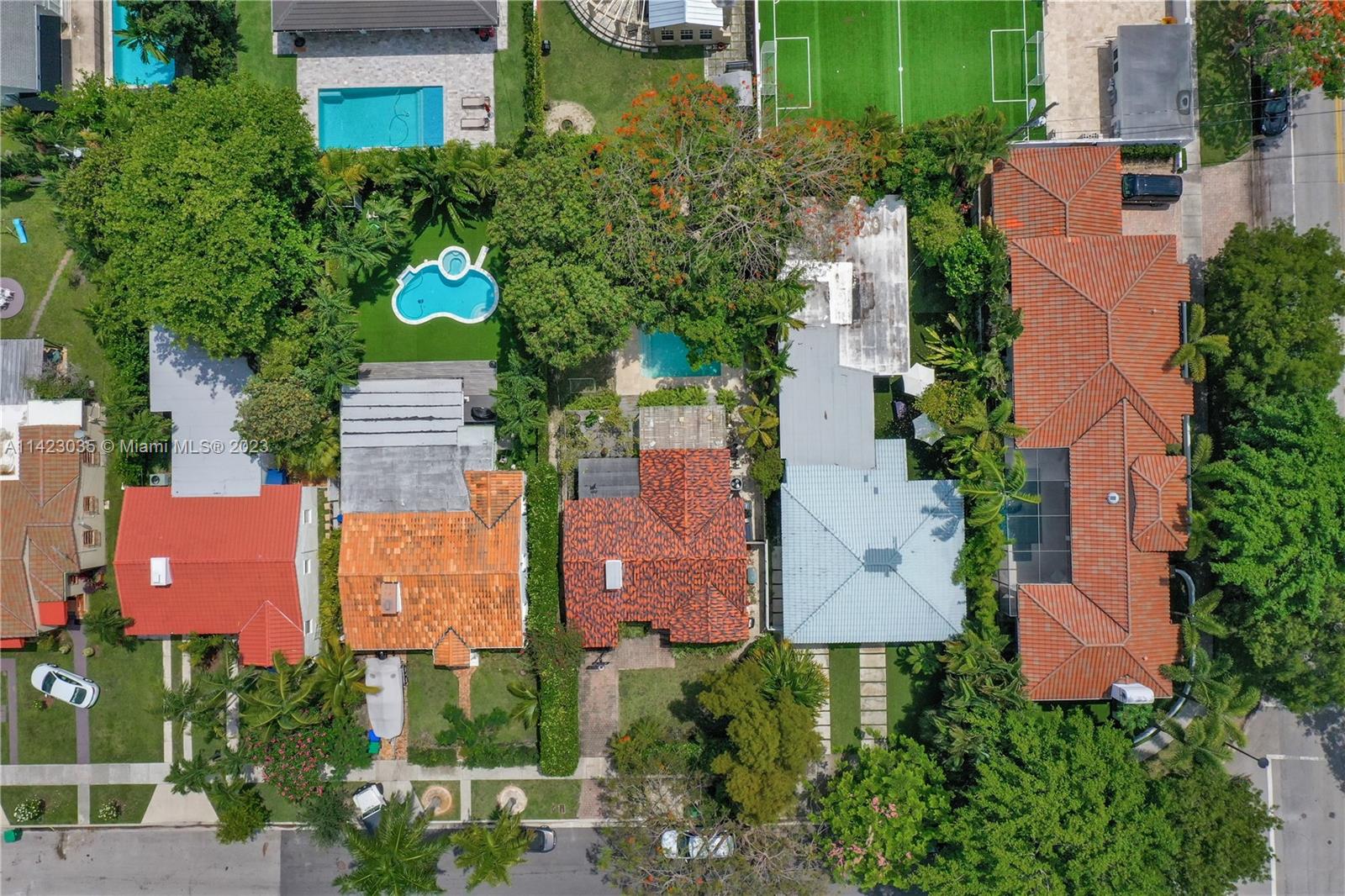 419 Southwest 30th Road, Unit 419 Miami, FL 33129 - Photo 21 of 21 an aerial view of a house with swimming pool outdoor seating and yard