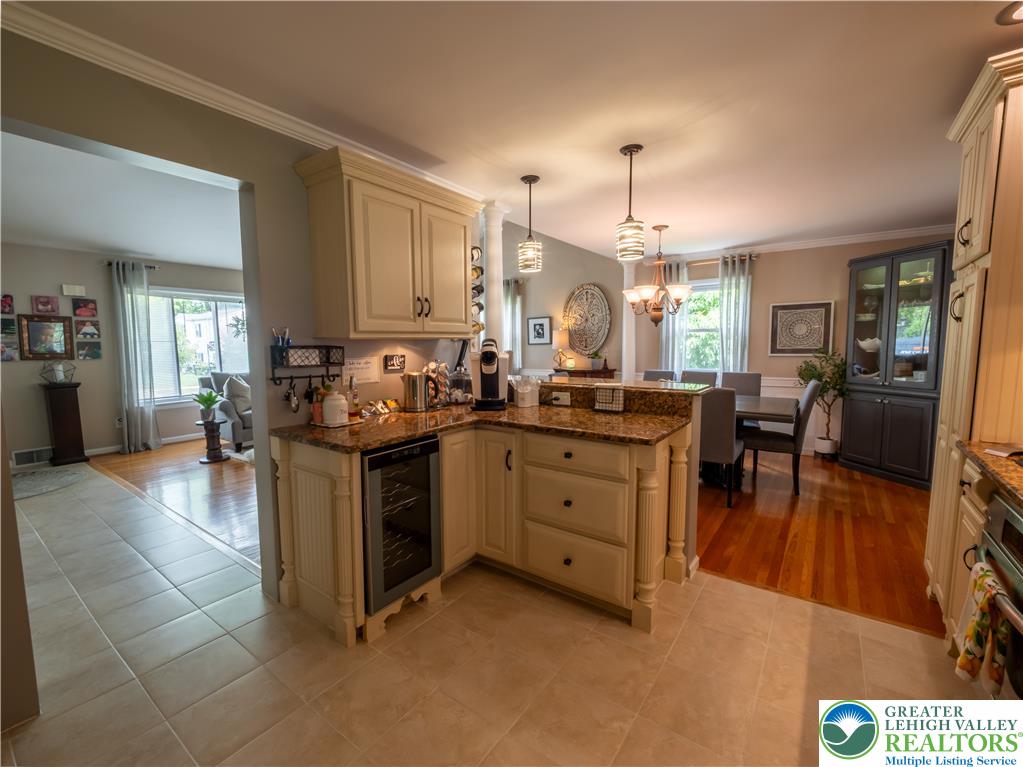2087 Hopewell Road Bethlehem, PA 18017 - Photo 18 of 38 A well-appointed kitchen corner with granite counters flows seamlessly into the dining space, perfect for entertaining.