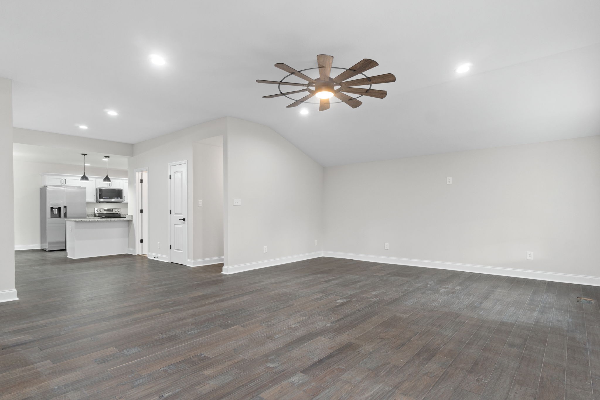 4366 Old Metal Road Palmyra, TN 37142 - Photo 14 of 43 a view of empty room with wooden floor