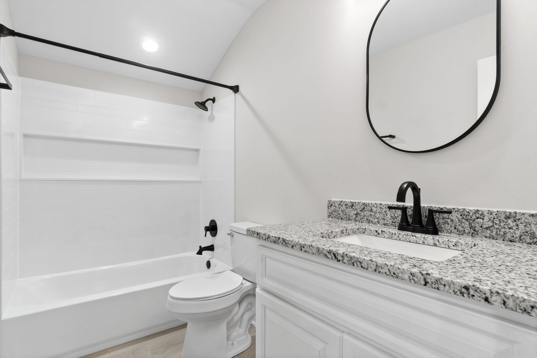 4366 Old Metal Road Palmyra, TN 37142 - Photo 29 of 43 a bathroom with a sink a toilet and a mirror