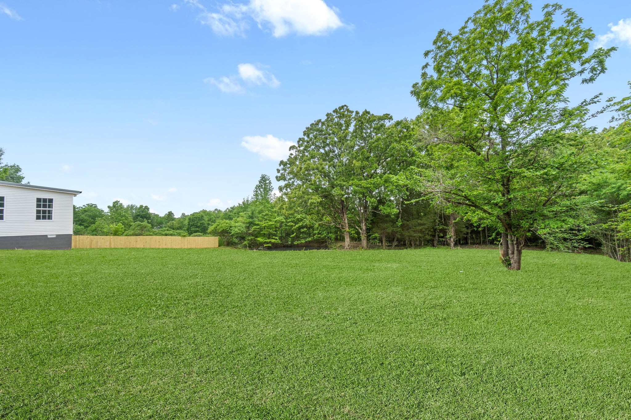 4366 Old Metal Road Palmyra, TN 37142 - Photo 36 of 43 a view of field with a trees in the background