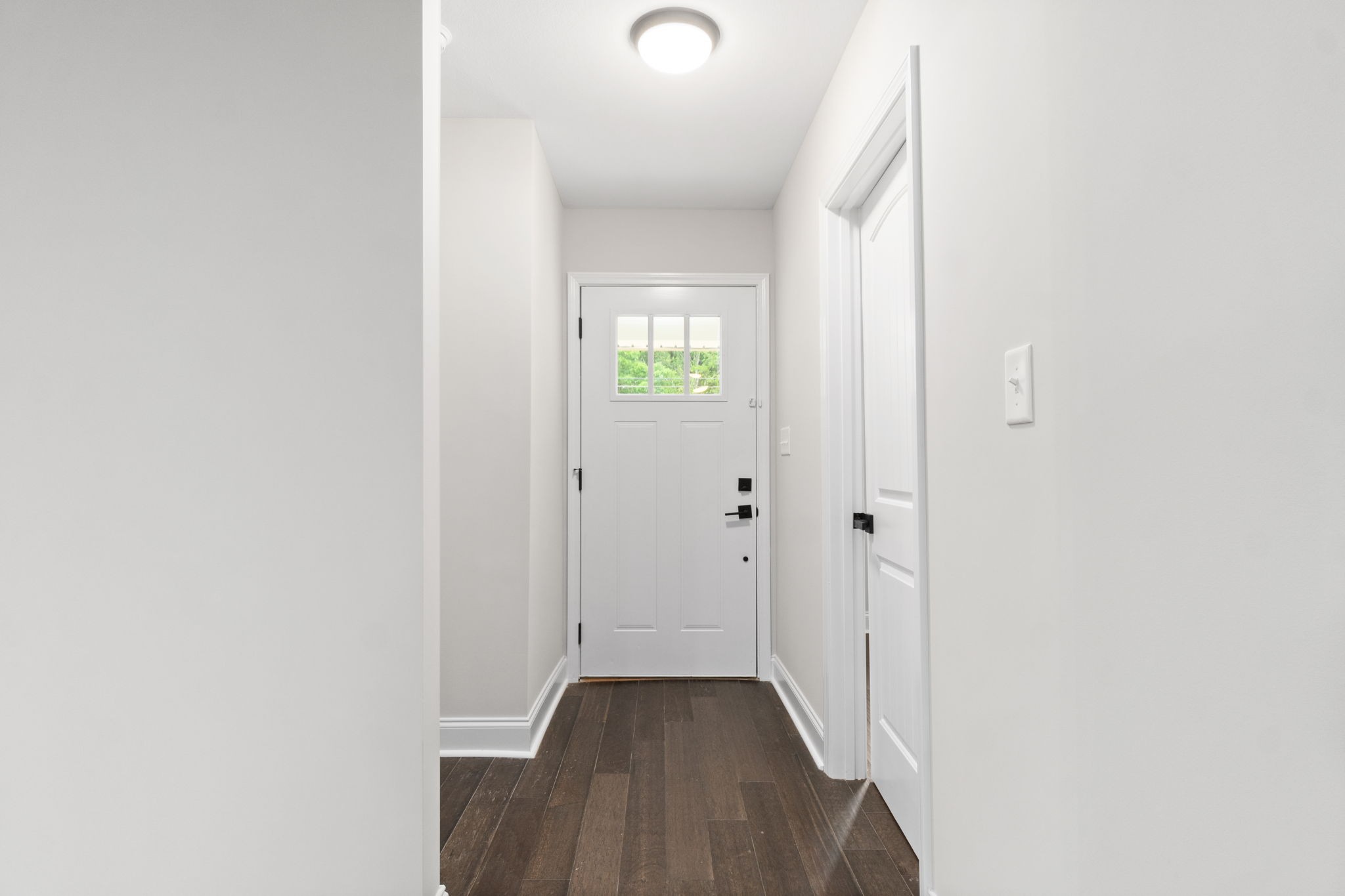 4366 Old Metal Road Palmyra, TN 37142 - Photo 10 of 43 a view of an entryway with wooden floor