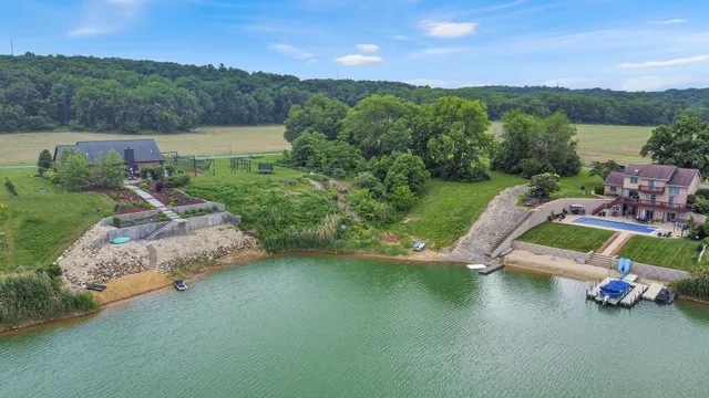 a view of a lake with a yard