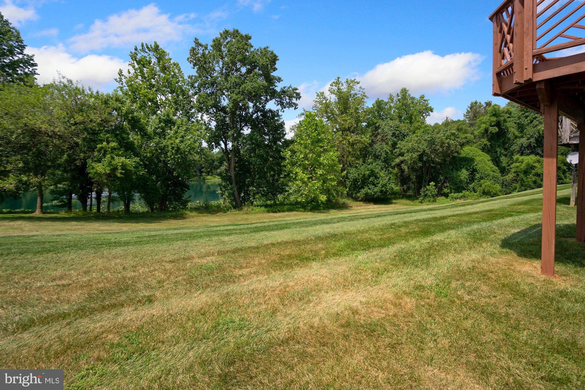 12613 Spriggs Request Court Bowie, MD 20721 - Photo 44 of 48 Back yard, with a view of the lake