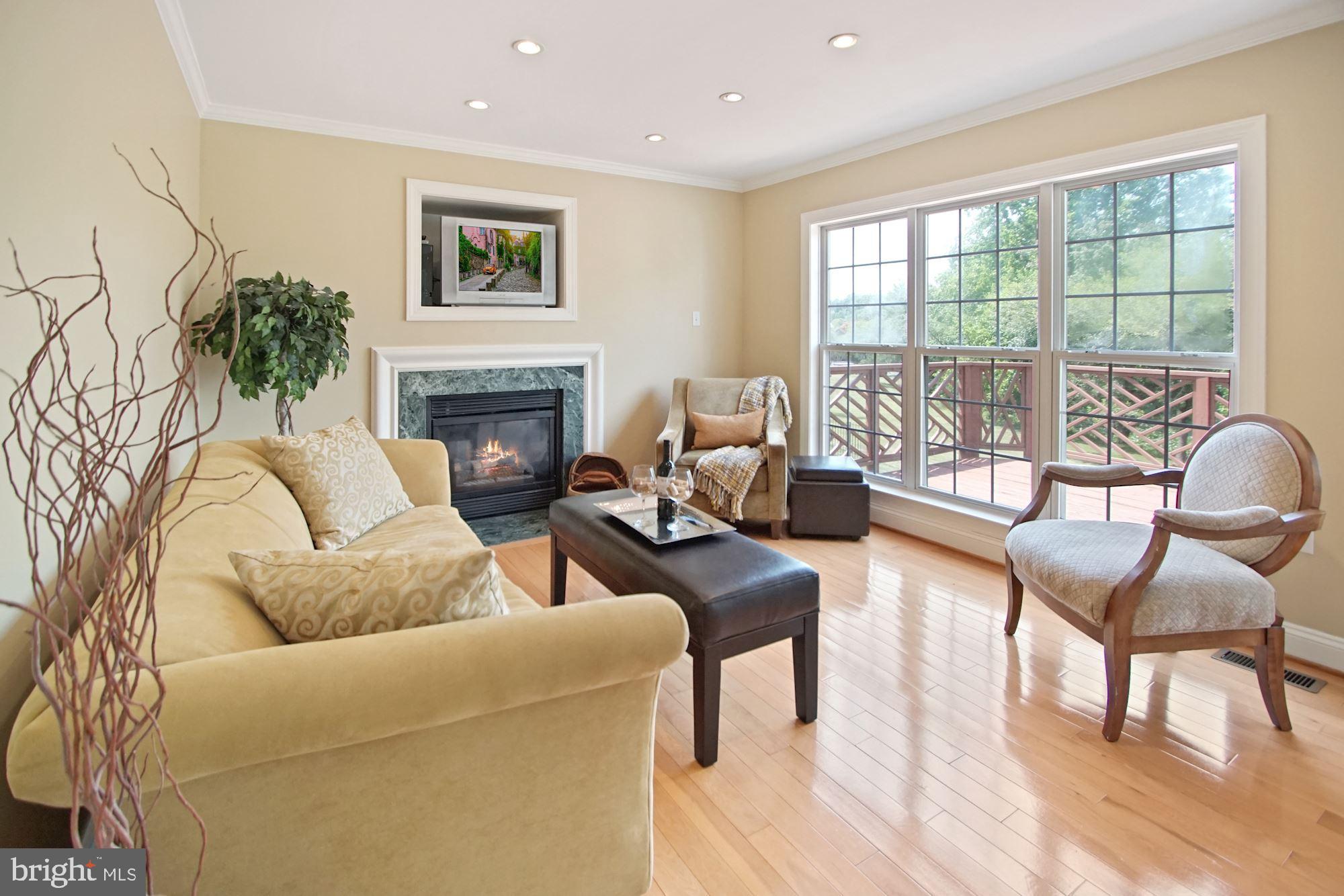 12613 Spriggs Request Court Bowie, MD 20721 - Photo 10 of 48 Family room, with view of the deck & back yard