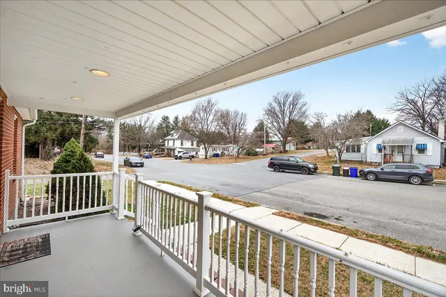 a view of a street from a balcony