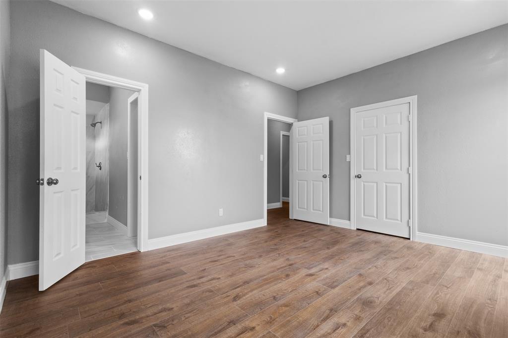 7074 Northeast County Road Rice, TX 75155 - Photo 10 of 22 a view of an empty room with wooden floor