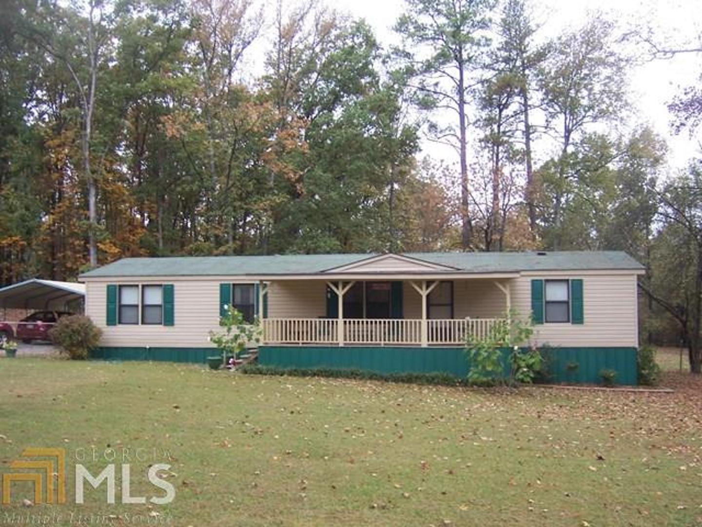 564 Turner Bend Road Southwest Rome, GA 30165 - Photo 1 of 1 front view of house with a yard