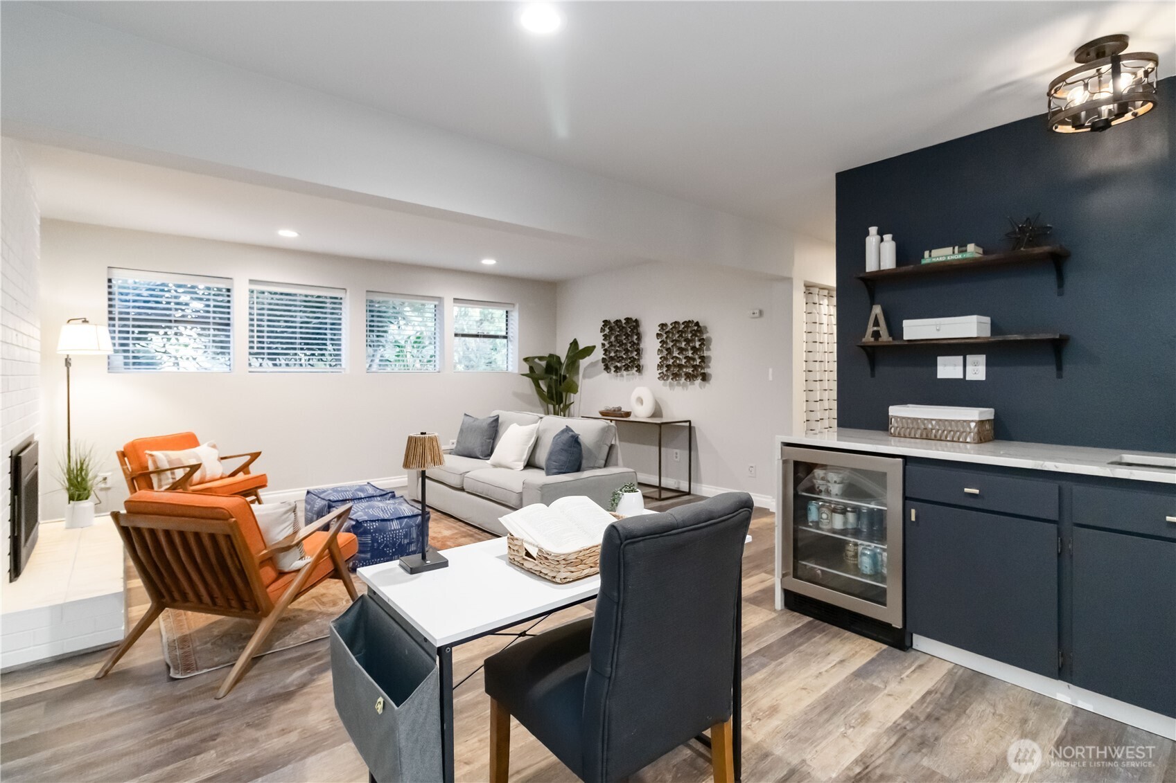 10621 Northeast 147th Street Bothell, WA 98011 - Photo 19 of 36 a living room with furniture a rug and a window