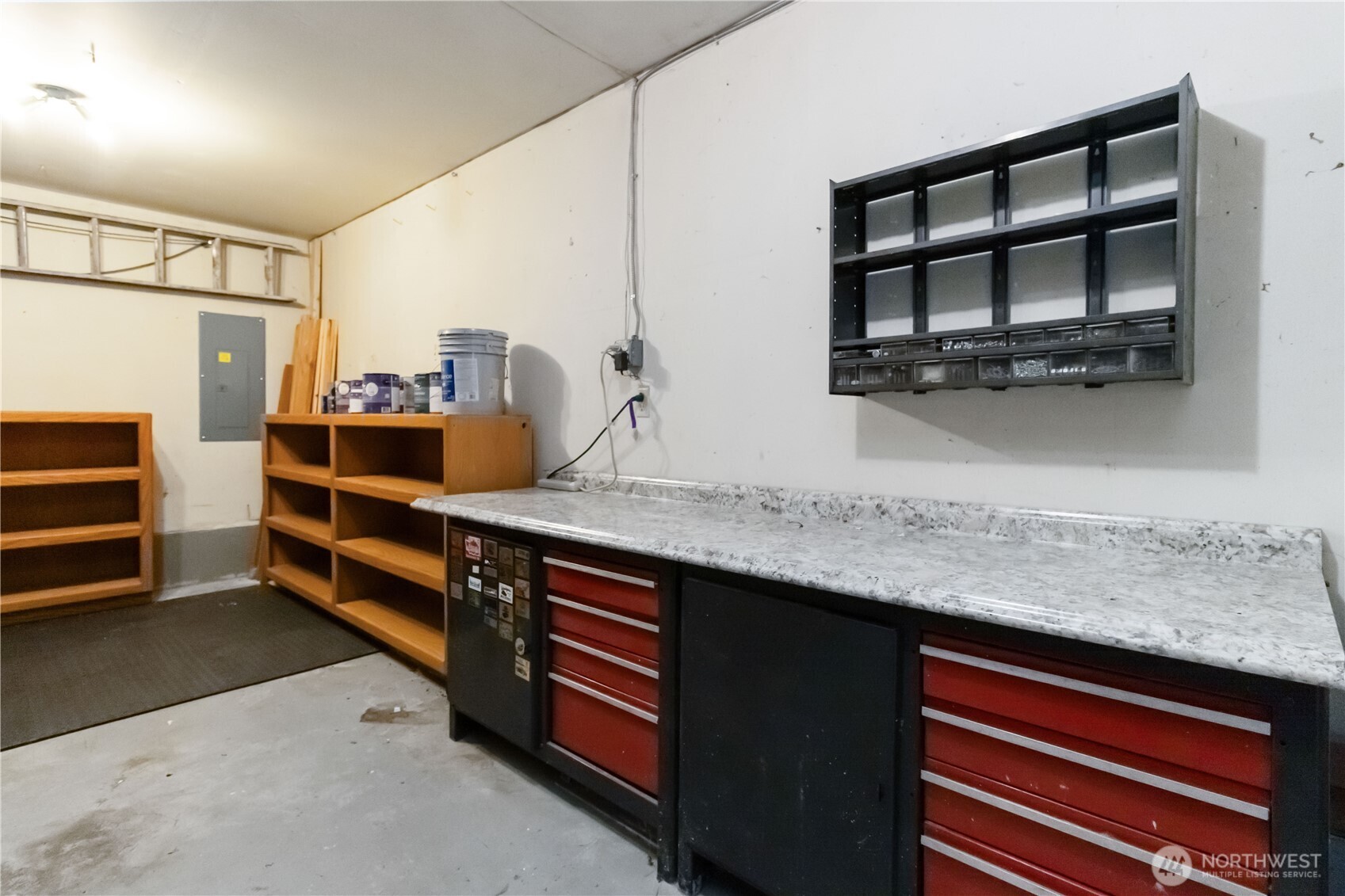 10621 Northeast 147th Street Bothell, WA 98011 - Photo 26 of 36 a kitchen with stainless steel appliances granite countertop a stove and a microwave
