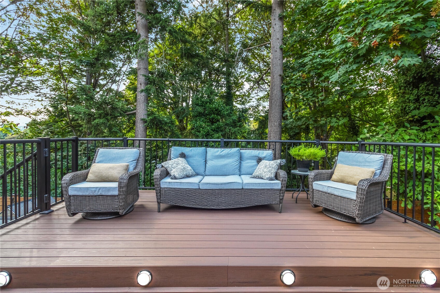 10621 Northeast 147th Street Bothell, WA 98011 - Photo 27 of 36 a view of a roof deck with couches and potted plants