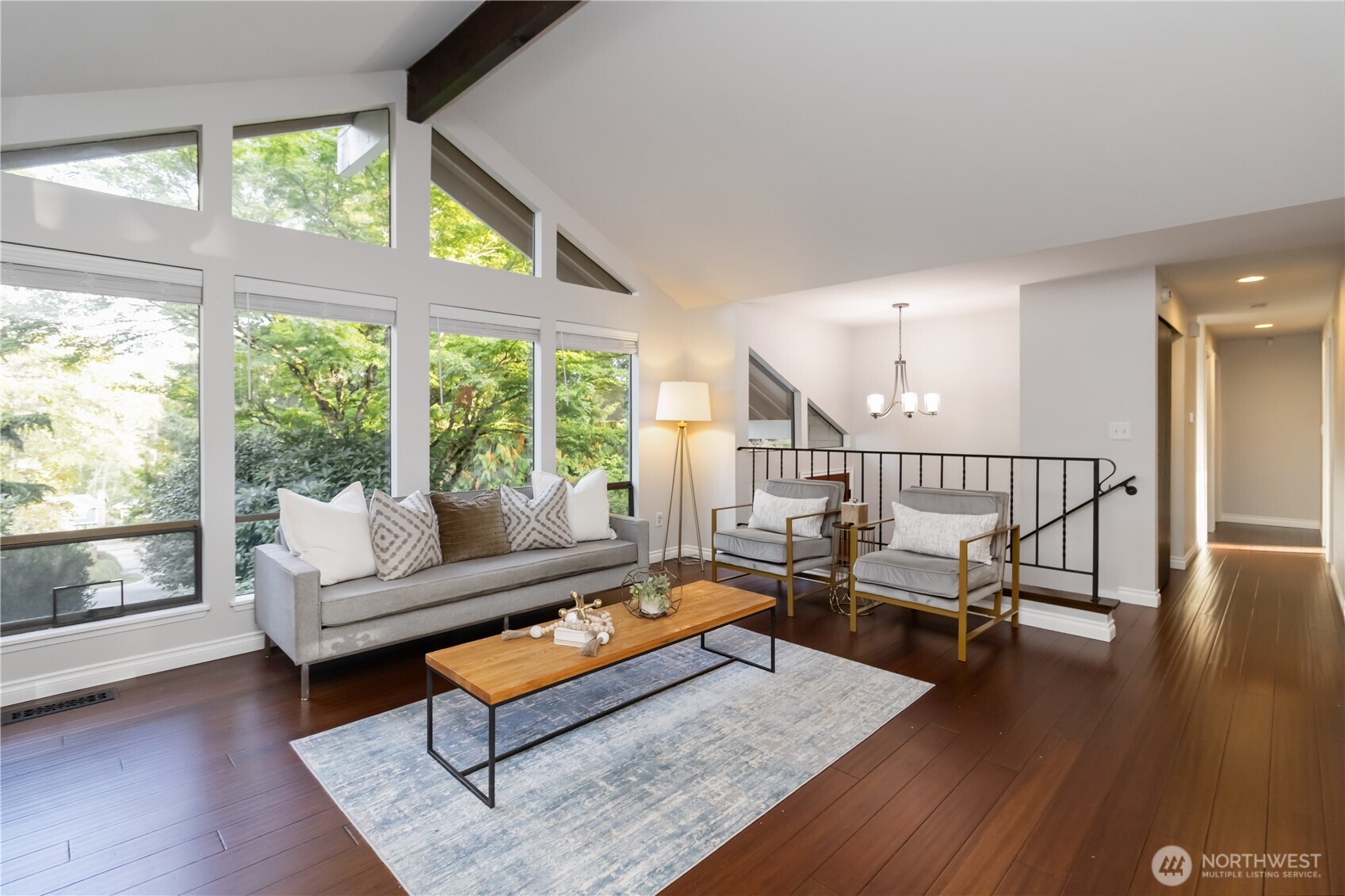 10621 Northeast 147th Street Bothell, WA 98011 - Photo 5 of 36 a living room with furniture and a wooden floor