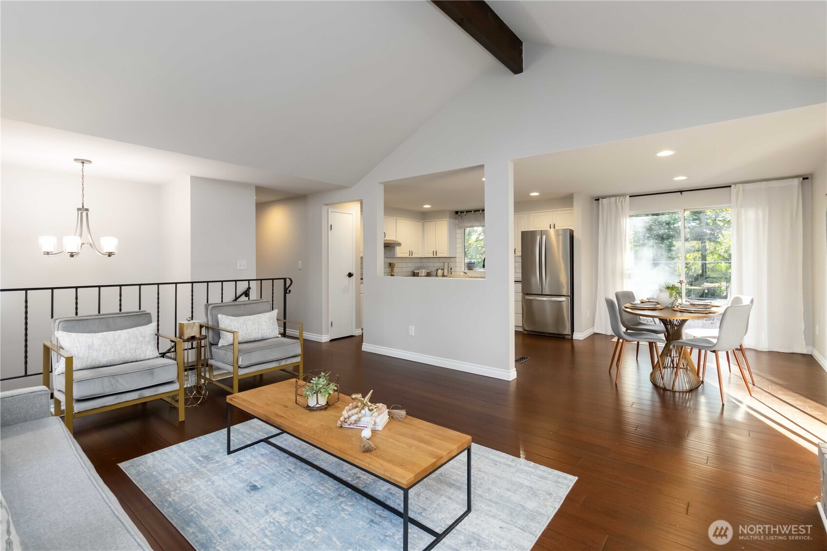 10621 Northeast 147th Street Bothell, WA 98011 - Photo 8 of 36 a living room with furniture and a wooden floor