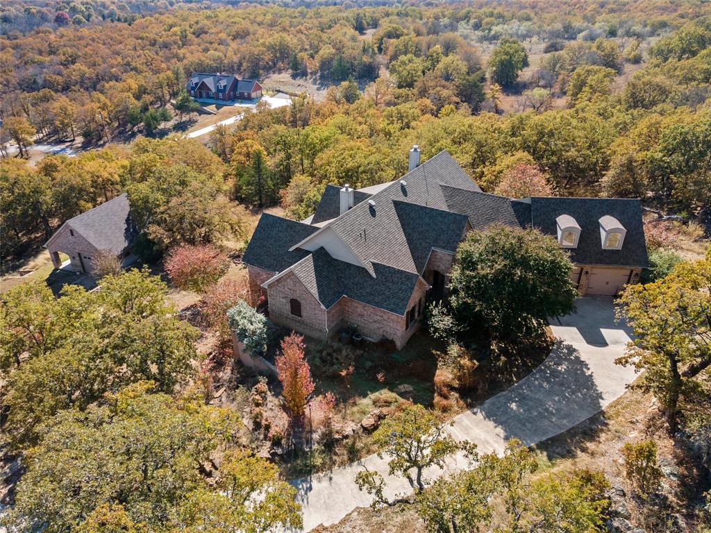 396 Ranchview Court Bowie, TX 76230 - Photo 30 of 38 an aerial view of house with a yard