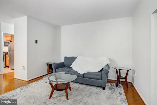 a bedroom with a bed and a table
