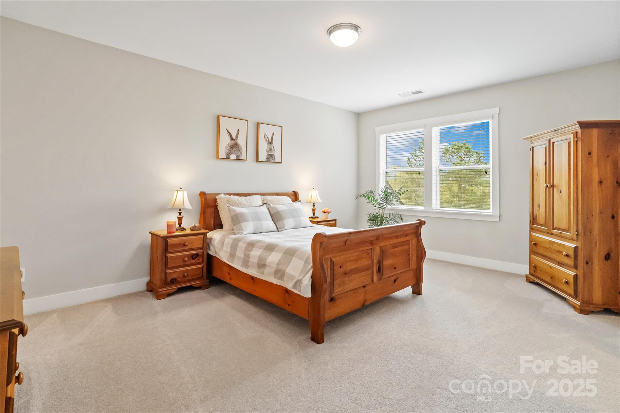 1953 Masons Bend Drive Fort Mill, SC 29708 - Photo 23 of 40 a bedroom with a bed and a couch