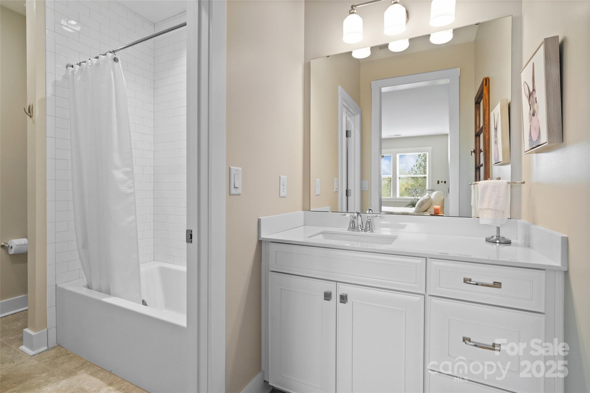 1953 Masons Bend Drive Fort Mill, SC 29708 - Photo 24 of 40 a bathroom with a granite countertop sink a mirror and a shower
